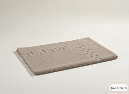 Cotton mat in Rooted Chestnut from the Ritual Edit collection

